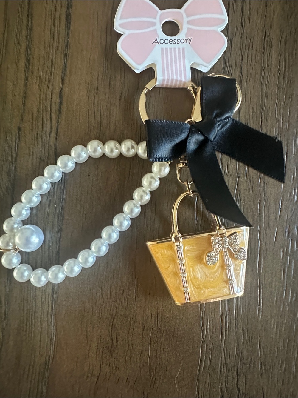 Pearl-Accent Yellow Handbag Keychain with Black Bow